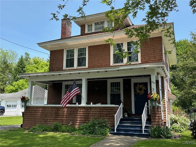 616 N Main St, Herkimer, NY 13350 - american foursquare style home featuring covered porch and a chimney