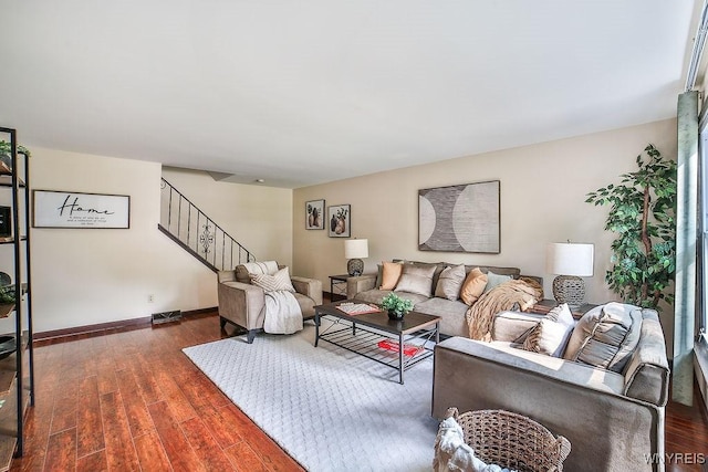 305 Vine Ln, Amherst, NY 14228 - living room with stairway, wood finished floors, and baseboards