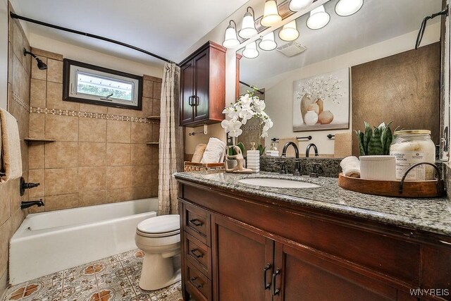 305 Vine Ln, Amherst, NY 14228 - bathroom with shower / tub combo, toilet, vanity, and tile patterned floors