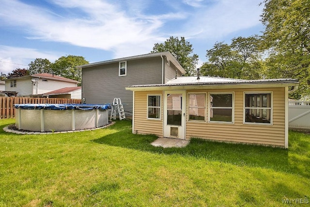 305 Vine Ln, Amherst, NY 14228 - rear view of property with metal roof