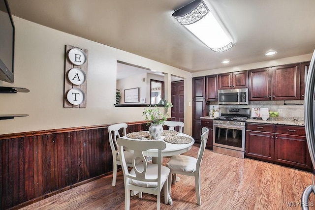 305 Vine Ln, Amherst, NY 14228 - kitchen featuring appliances with stainless steel finishes and light wood-type flooring
