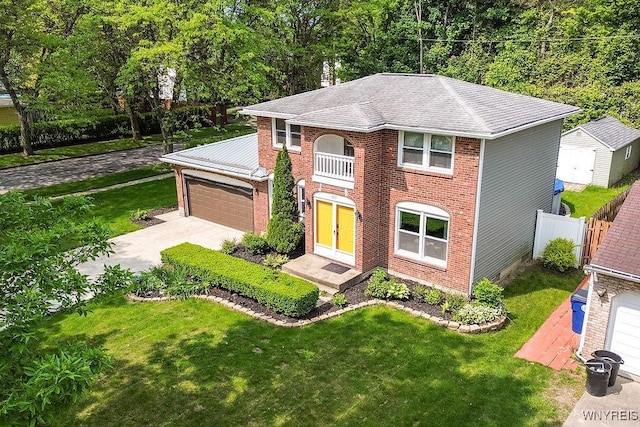 305 Vine Ln, Amherst, NY 14228 - georgian-style home with driveway and an attached garage