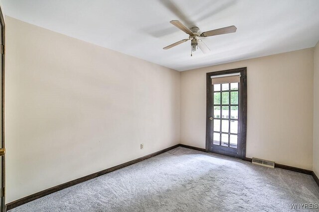305 Vine Ln, Amherst, NY 14228 - carpeted empty room with baseboards and a ceiling fan