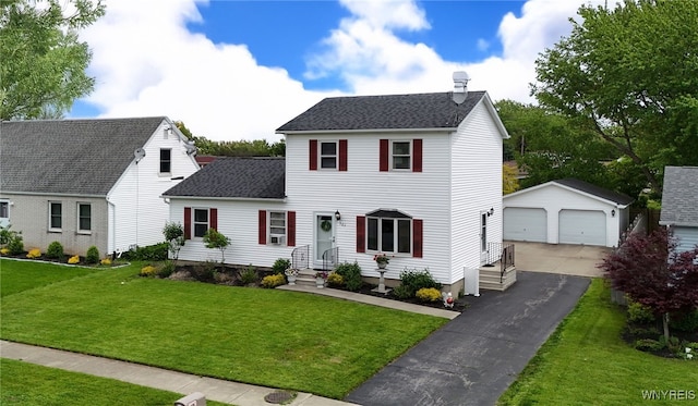 283 Summit Ave, West Seneca, NY 14224 - view of front facade featuring an outbuilding, a garage, a shingled roof, and a front lawn