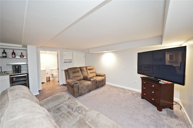 283 Summit Ave, West Seneca, NY 14224 - living room with bar with sink, wine cooler, baseboards, and light colored carpet