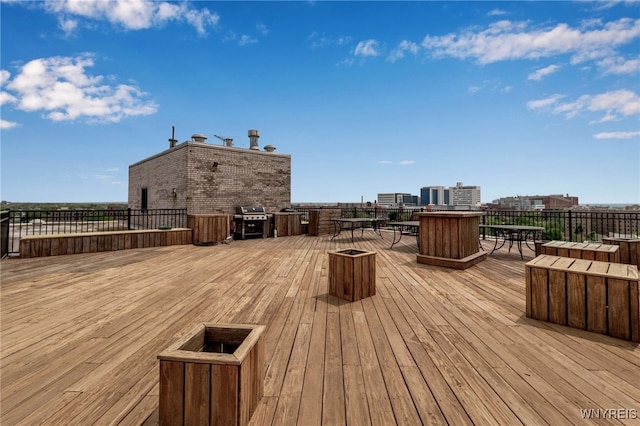 849 Delaware Ave Unit 205, Buffalo, NY 14209 - wooden deck featuring outdoor dining space and grilling area