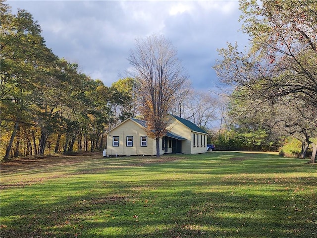 655 County Highway 26, Otsego, NY 13337 - view of home's exterior with a yard