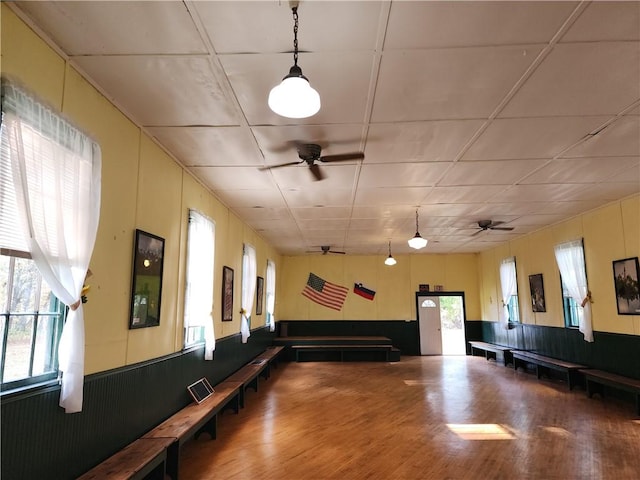 655 County Highway 26, Otsego, NY 13337 - misc room with a ceiling fan, plenty of natural light, wood finished floors, and wainscoting