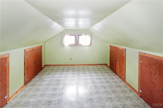 6341 Number Four Rd, Watson, NY 13367 - additional living space with lofted ceiling and baseboards