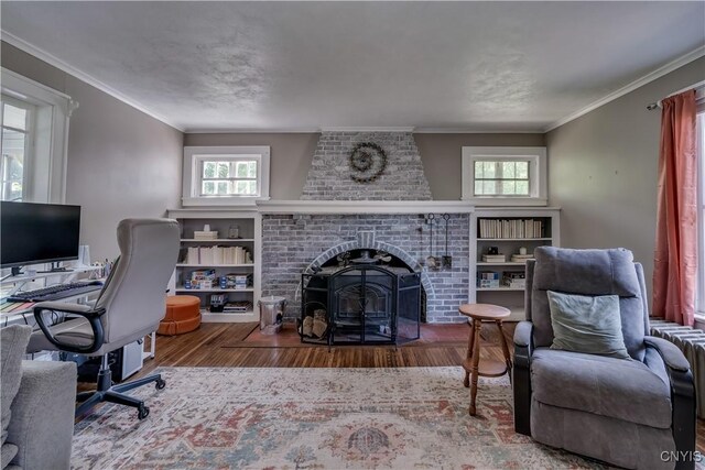 621 N Hycliff Dr, Watertown-City, NY 13601 - home office with wood finished floors, a brick fireplace, and crown molding