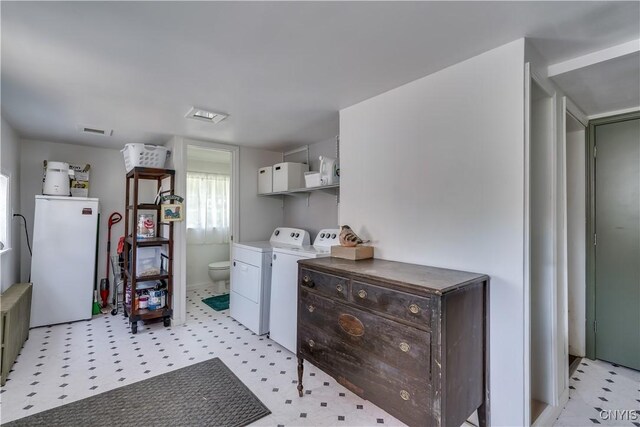621 N Hycliff Dr, Watertown-City, NY 13601 - washroom with light flooring and washer and clothes dryer