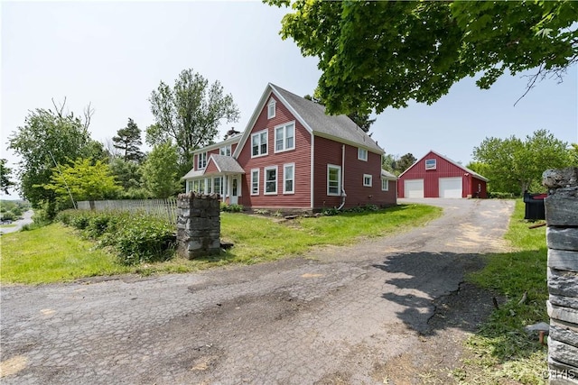 621 N Hycliff Dr, Watertown-City, NY 13601 - view of front of property with a detached garage and an outdoor structure