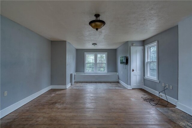 621 N Hycliff Dr, Watertown-City, NY 13601 - unfurnished dining area with wood finished floors and baseboards
