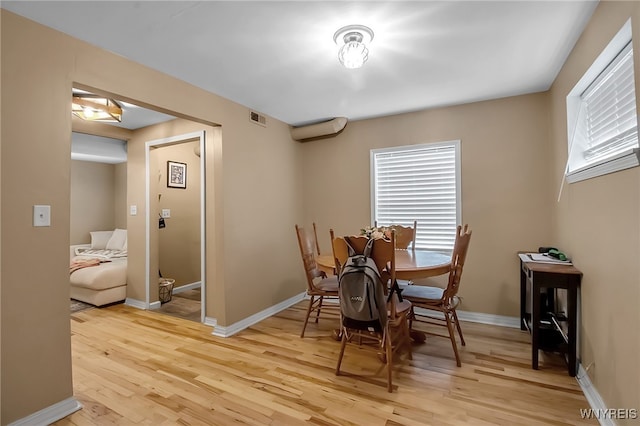 283 W Tupper St, Buffalo, NY 14201 - dining space featuring light wood-style flooring, healthy amount of natural light, and baseboards