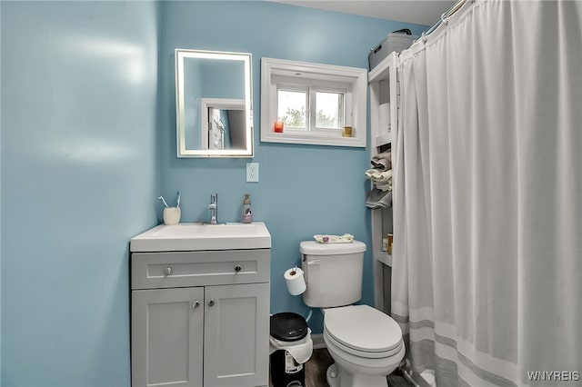283 W Tupper St, Buffalo, NY 14201 - bathroom featuring vanity, toilet, and a shower with curtain