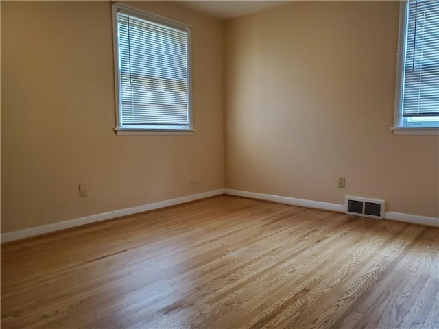 526 Winchester St, Rochester, NY 14615 - unfurnished room with wood finished floors and baseboards