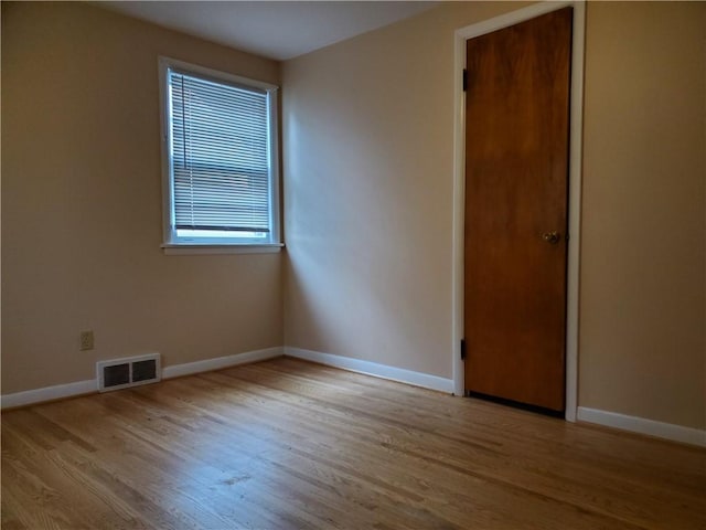 526 Winchester St, Rochester, NY 14615 - spare room featuring wood finished floors and baseboards
