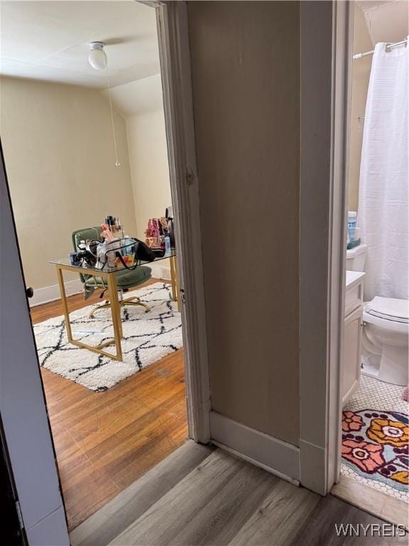 44 Freeman St, Buffalo, NY 14215 - hall with wood finished floors, baseboards, and lofted ceiling