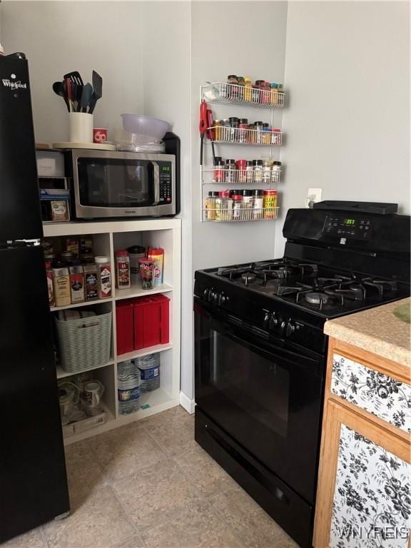 44 Freeman St, Buffalo, NY 14215 - kitchen with black appliances