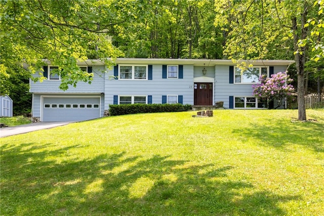25 Highland Dr, Corning-City, NY 14830 - split foyer home with driveway, a front yard, and a garage