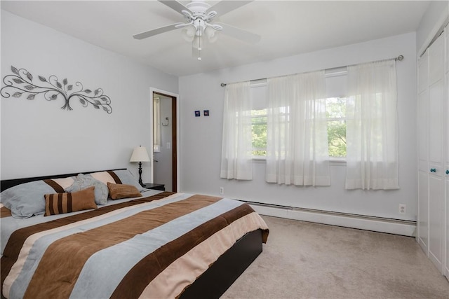 25 Highland Dr, Corning-City, NY 14830 - carpeted bedroom with a baseboard heating unit and ceiling fan