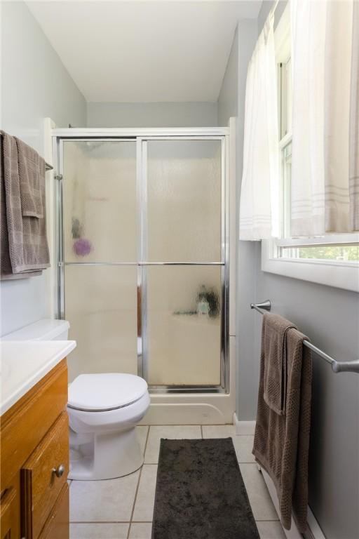 25 Highland Dr, Corning-City, NY 14830 - bathroom featuring a stall shower, vanity, and tile patterned floors