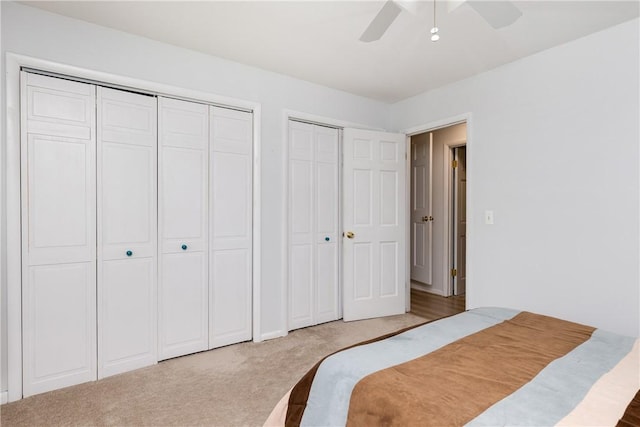 25 Highland Dr, Corning-City, NY 14830 - carpeted bedroom with two closets and ceiling fan