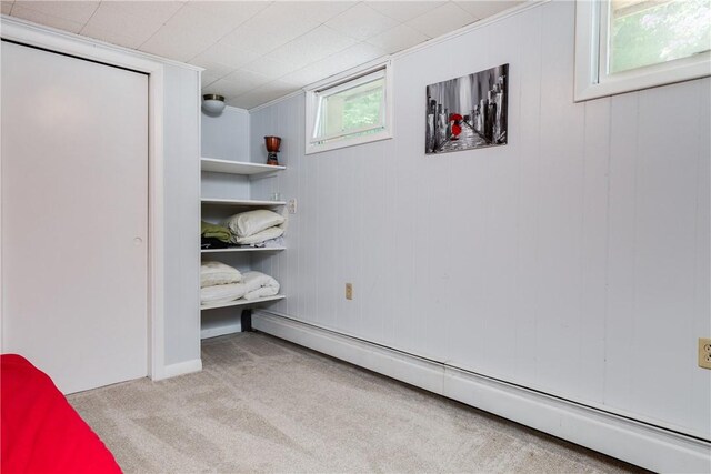 25 Highland Dr, Corning-City, NY 14830 - carpeted bedroom with a baseboard radiator