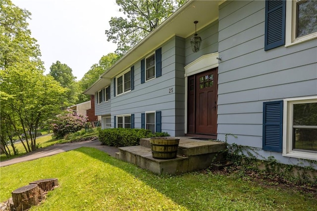 25 Highland Dr, Corning-City, NY 14830 - doorway to property with a lawn