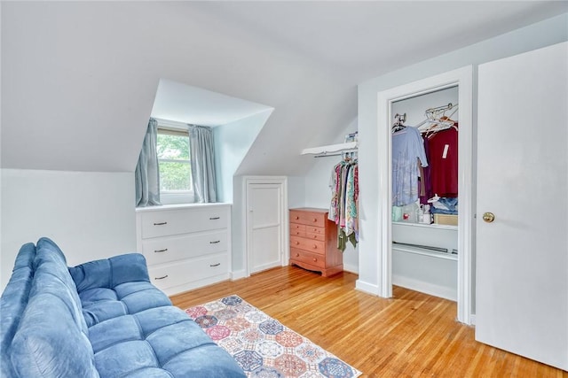 350 Colebourne Rd, Rochester, NY 14609 - living area featuring vaulted ceiling and light wood-style flooring