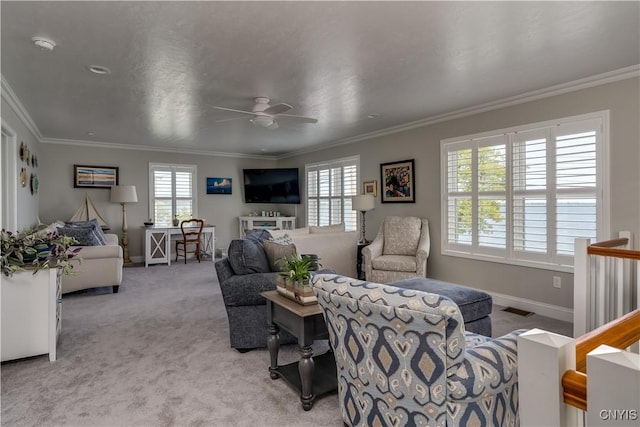 32160 State Route 12e, Cape Vincent, NY 13618 - carpeted living area with ceiling fan, crown molding, and baseboards