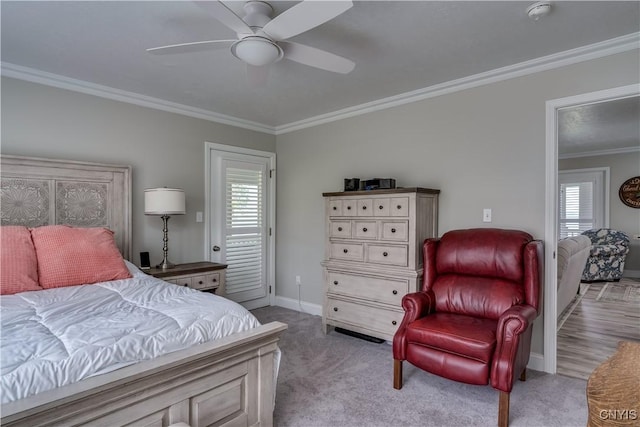 32160 State Route 12e, Cape Vincent, NY 13618 - carpeted bedroom with crown molding, multiple windows, baseboards, and ceiling fan