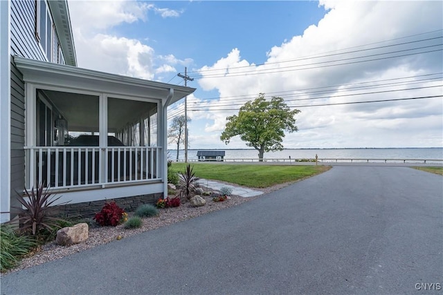 32160 State Route 12e, Cape Vincent, NY 13618 - view of grassy yard with a sunroom