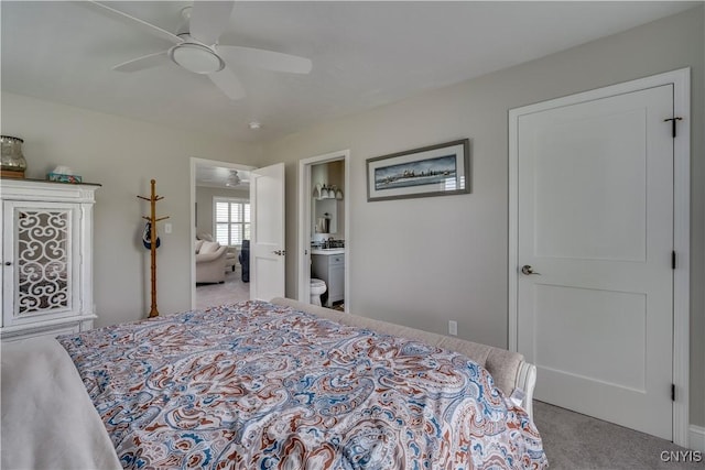 32160 State Route 12e, Cape Vincent, NY 13618 - bedroom with carpet flooring, ceiling fan, and connected bathroom