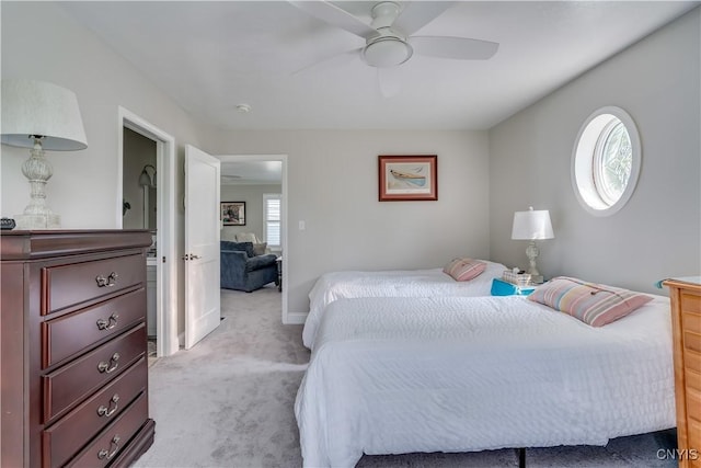 32160 State Route 12e, Cape Vincent, NY 13618 - bedroom featuring light colored carpet, a ceiling fan, and baseboards
