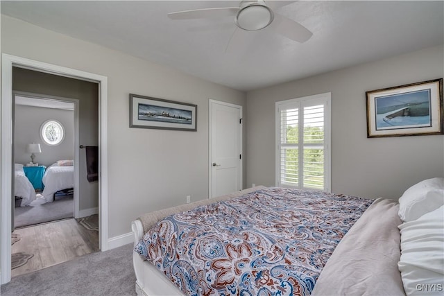 32160 State Route 12e, Cape Vincent, NY 13618 - carpeted bedroom with baseboards and a ceiling fan