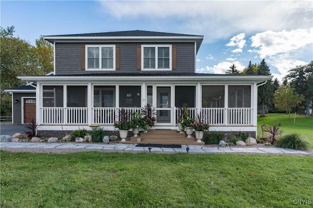 32160 State Route 12e, Cape Vincent, NY 13618 - view of front of house featuring a sunroom, a front yard, roof with shingles, and a garage