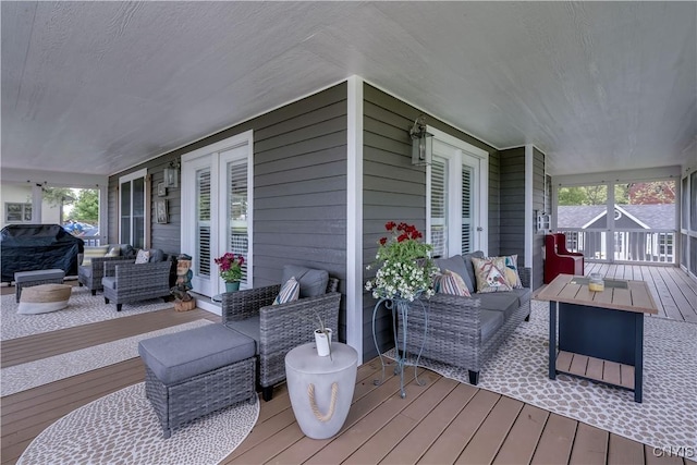 32160 State Route 12e, Cape Vincent, NY 13618 - wooden terrace with outdoor lounge area