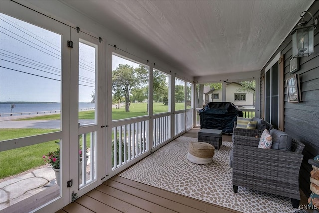 32160 State Route 12e, Cape Vincent, NY 13618 - sunroom / solarium with a water view