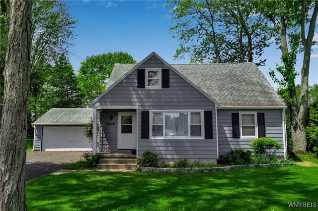 6764 Sy Rd, Wheatfield, NY 14304 - view of front of home featuring roof with shingles, a front lawn, and driveway