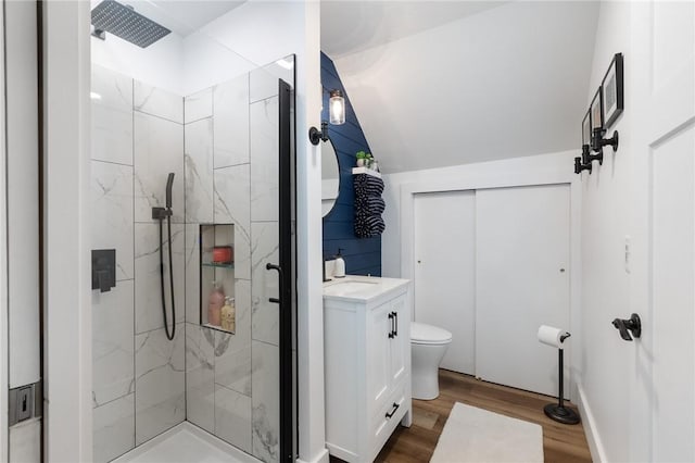 7698 Ridge Rd, Sodus, NY 14551 - full bathroom with a marble finish shower, vanity, wood finished floors, toilet, and lofted ceiling