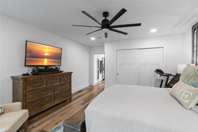 7698 Ridge Rd, Sodus, NY 14551 - bedroom featuring wood finished floors, recessed lighting, a closet, ceiling fan, and baseboards