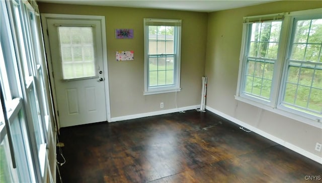 4284 Cleveland Rd, Onondaga, NY 13215 - foyer with baseboards and dark wood-type flooring