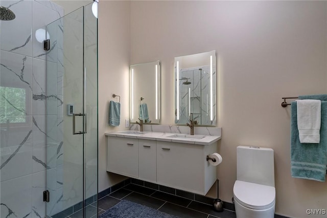 3502 Lightfoot Ln, Lysander, NY 13027 - bathroom featuring a marble finish shower, double vanity, toilet, and tile patterned flooring