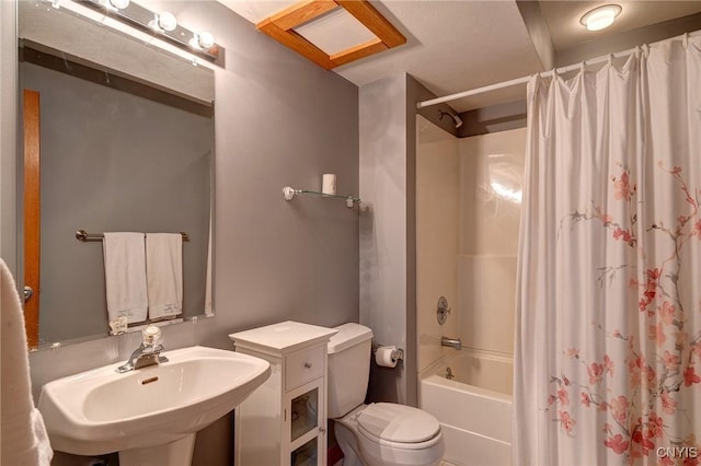 3502 Lightfoot Ln, Lysander, NY 13027 - bathroom with a sink, toilet, and shower / bath combination with curtain
