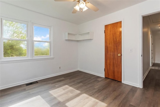 4411 Williamson Rd, Marion, NY 14505 - unfurnished bedroom with attic access, wood finished floors, baseboards, and a ceiling fan