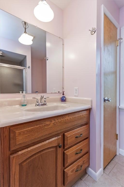 4411 Williamson Rd, Marion, NY 14505 - bathroom with tile patterned flooring and vanity