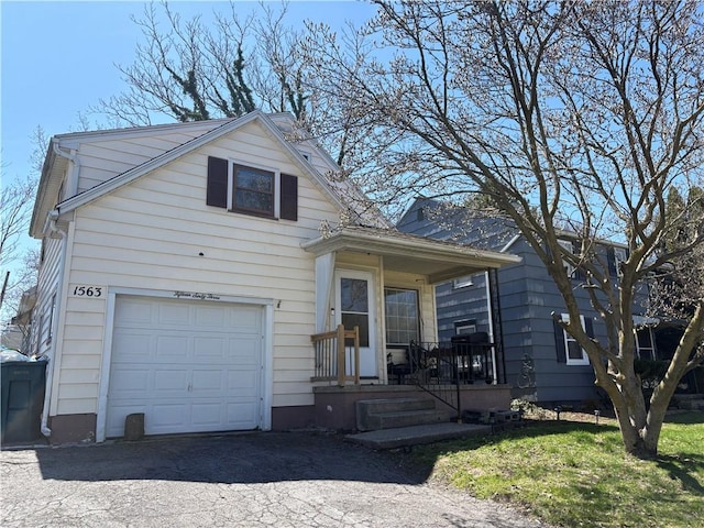 1563 Norton St, Rochester, NY 14621 - view of front of home featuring an attached garage and driveway