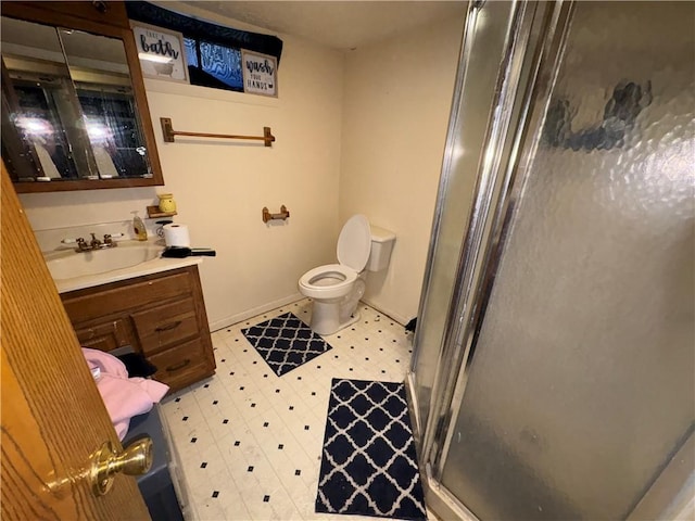 1563 Norton St, Rochester, NY 14621 - full bathroom with a shower stall, vanity, tile patterned floors, and toilet