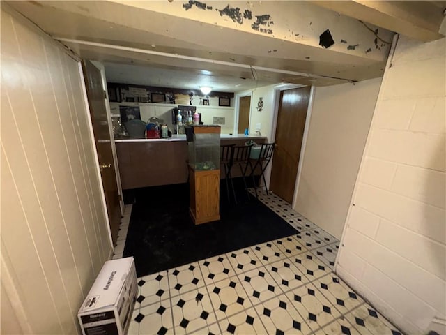 1563 Norton St, Rochester, NY 14621 - finished below grade area with concrete block wall and a dry bar